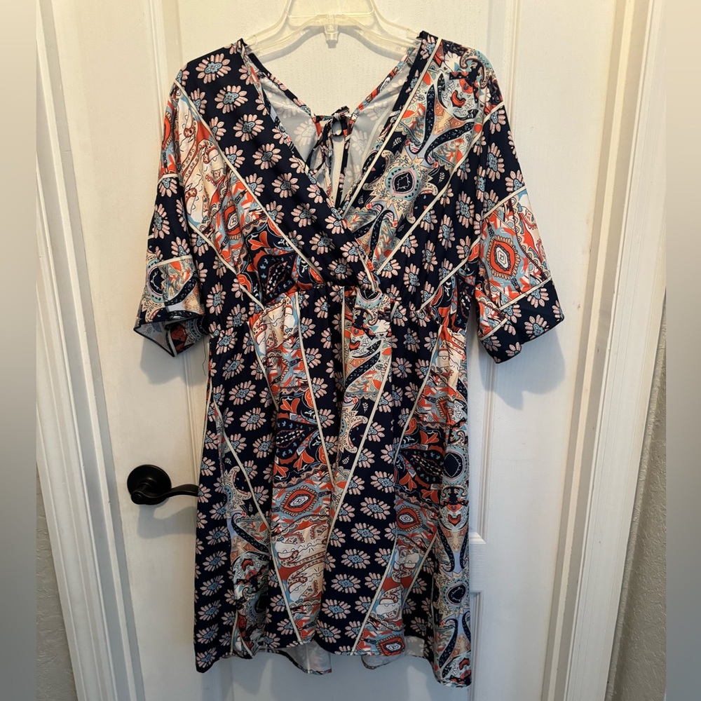 Cute XL just at the knee length dress.